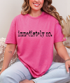 Flat position of the Sassy 'Immediately No' Graphic Tee with a playful backdrop, perfect for social media promotion of the graphic t-shirt.