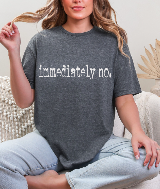 Model wearing the Sassy 'Immediately No' Graphic Tee with jeans, illustrating the comfortable casual style for everyday wear.