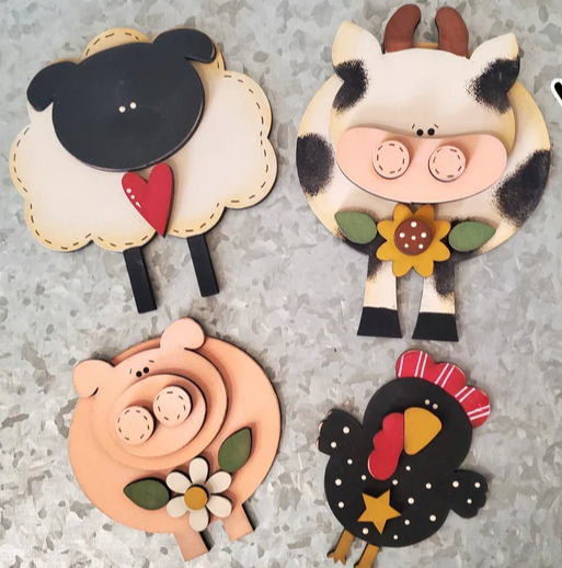 Sit Back & Craft DIY Box showcasing adorable animal-themed decorations, including sheep, cow, pig, and chicken designs, perfect for DIY enthusiasts.